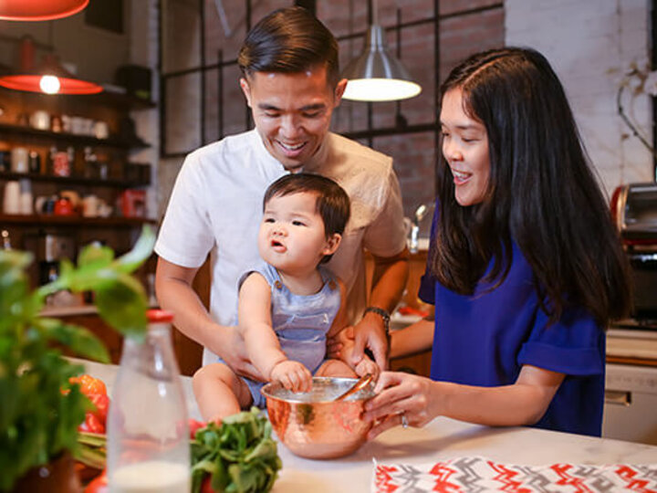 Family making a meal.