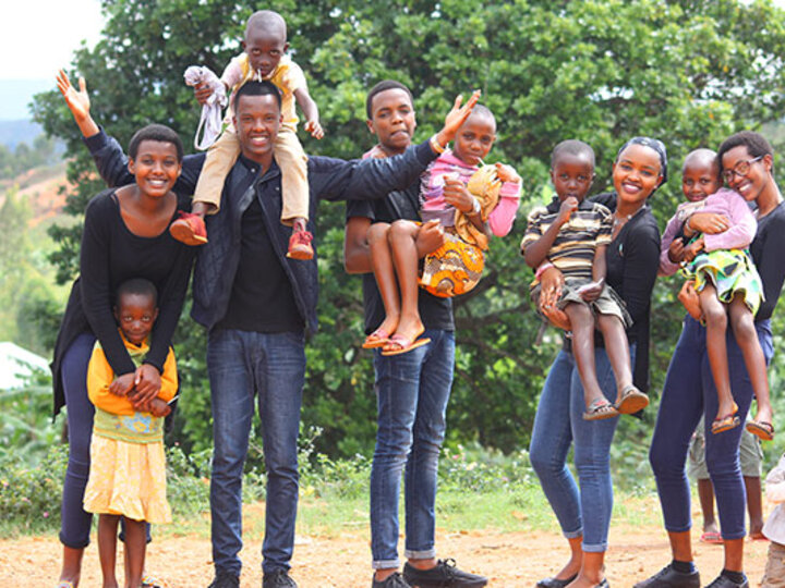 Large family group standing outside.