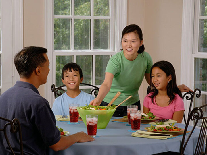 Family at dinner table.